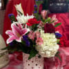 Beautifully decorated cylinder vase with mixed flowers for your special Valentine. 