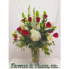 Red and White roses, white hydrangea, hybrid lilies, snapdragons and bells of