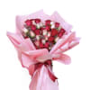 A heart-shaped bouquet of roses in romantic shades
of red and pink,arranged in