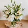 Theme Colors: Shades of whites

Featured Blooms: Roses, Lilies, Hydrangea, Spray Roses, Seasonal