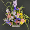 Take a trip down memory lane with this beautiful planter style arrangement.
