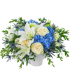 Skybound Blooms is a serene and elegant mix of Lilies, Roses, Hydrangea