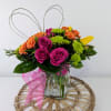 Send bright radiant blooms including spray roses, tulips and green kermits to