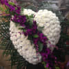 HEART SHAPE SYMPATHY PIECE WITH PURPLE DENDROBIUM ORCHIDS AND BELLS OF IRELAND