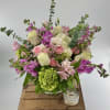 Introducing our premium floral arrangement, dazzling with shades of green, white, pink