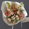 A sculptural bouquet in warm nude tones, combining airy elegance with a