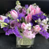 The sweetest collection of Purple blossoms and pink tulips among few other