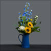 Vibrant blue pitcher filled with delphinium, Sunflowers, Craspedia, Roses, Iris, and
asters. Approximate