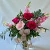 All pink arrangement. Includes roses, gerber daisies, snapdragon, waxflower, and carnations. 