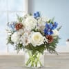 Graceful, elegant and timeless, this beautiful winter bouquet offers up colors, blossoms