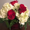Red roses and white hydrangea are simple, bur perfect ways to express