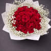 A timeless romantic arrangement featuring lush deep red blooms surrounded by a