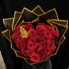 This luxury bouquet of fresh red roses arranged in a heart shape