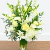 Graceful and timeless, Eternal Elegance features a luxurious blend of white roses