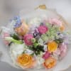 Flowers: free spirit roses, alstromeria, tulips, ranunuclus, white hydrangea, spray roses, green