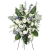 A serene blue, white &amp; lavender sympathy standing spray designed with elegant