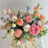 Meadow Blush features a soft, garden-inspired mix of pinks, peaches, lavenders, and