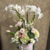Send hugs and kisses with this sweet pink and white arrangement. 
Type