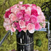 Vibrant pink and hot pink Roses and Spray Roses in a stylish