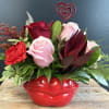 A striking lip‑shaped container becomes the heart of this Valentine&rsquo;s design, its