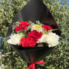 Handheld bouquet with a mix of red and white blooms.
Wrap color may