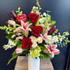 This Valentine&rsquo;s Day arrangement blends romance and charm with a graceful mix