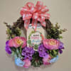  This "Think Happy Thoughts" silk wreath is sure to make a