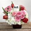 Whoooo is perched on top of these fine florals? A cute fuzzy