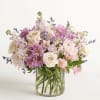 This bouquet in shades of blush pink and creamy white and lavender