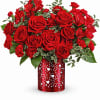 Red Rose Arrangement in a Heart Accent Vase

This striking red rose arrangement