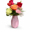 Romantic Rose &amp; Hydrangea Arrangement in a Pink Faceted Vase

This charming floral