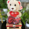 bear and heart chocolate box wrap in plastic basket 