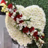 26' full heart wreath filled with white cushion pom mums with 24