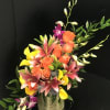 Send a arrangement of joy, which includes mini callas, orchids, roses accented