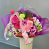  A lovely assortment of mixed flowers in the traditional colors of