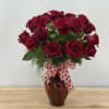 An outstanding arrangement including 18 stems of  Heart roses in a