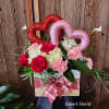 Arranged in a 9.5" Square x 6" High wooden crate, this arrangement
is