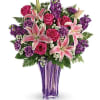 "The essence of luxury! This dramatic bouquet spoils her with a decadent