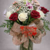 Red and white roses 6 each, lilies, carnations in a vase. Colors
