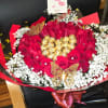 An impressive, opulent bouquet of selected red roses, designed in a perfect