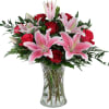 Our original Two Hearts arrangement showcases beautiful red roses and stargazer lilies