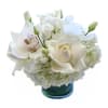 This beautiful arrangement is made up of white roses, lisanthus, hydrangeas and