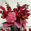 Indulge in a world of enchantment with our "Dark Romance" floral arrangement