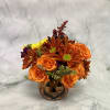 This arrangement is perfect for the spooky season. The arrangement includes aster