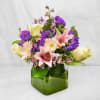 This beautiful arrangement includes stargazers, gerber daisies, roses, and more brilliant pink