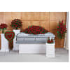 This radiant red rose collection includes six hand-arranged sympathy pieces, an elegant