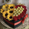 box of flowers  Sunflowers , Roses , and Ferrero Chocolates 