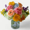 Celebrate life's most joyful moments with our Rainbow Radiance Bouquet, a bestselling