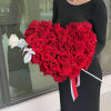 A breathtaking heart-shaped arrangement crafted from lush, premium red roses &mdash; the