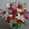 celebrate love with a lush Valentine's Day arrangement featuring classic red roses
